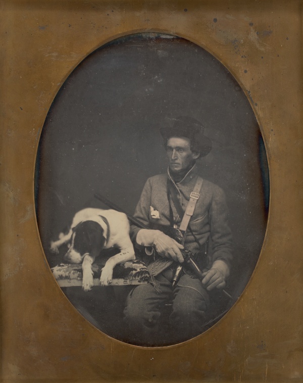 Untitled (Portrait of a Seated Man in Soldier Uniform with a Dog Lying to the Left of him)