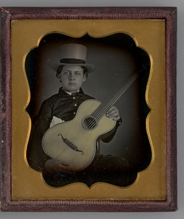 Untitled (Portrait of a Boy Holding a Guitar)