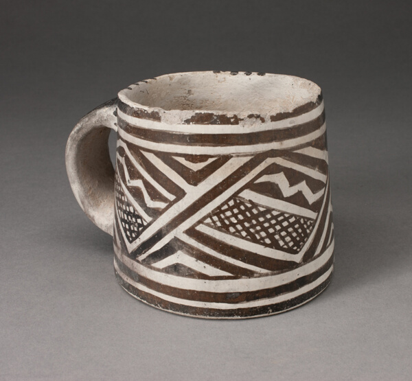 Mug with Interlocking Geometric Pattern with Zigzag Motifs and Crosshatching