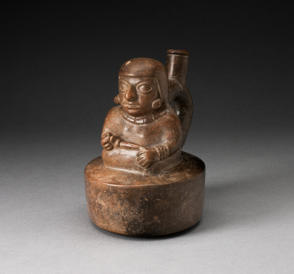 Blackware Spouted Vessel with a Seated Female Holding a Pipe or Staff