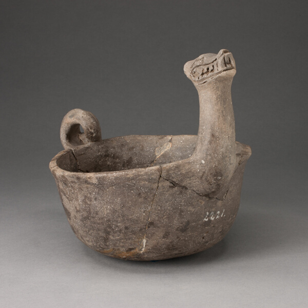 Bowl in the Shape of Underwater Serpent with Upturned Neck and Coiled Tail