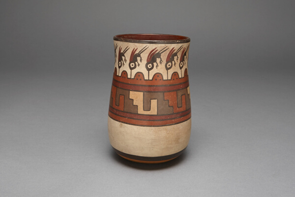 Beaker Depicting Abstract Hummingbirds or Insects
