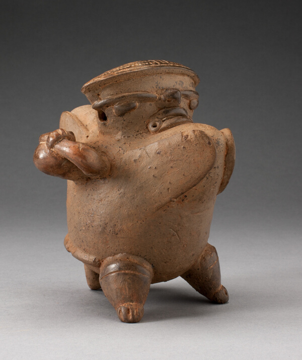 Vessel in the Form of a Hunchback Figure Carrying a Jar