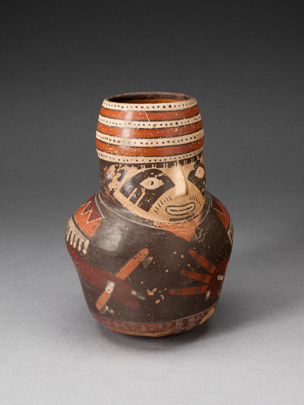 Jar in the Form of a Warrior Holding a Club and Other Weapons