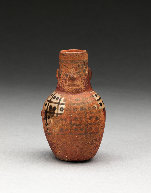 Miniature Jar in the Form of a Figure Wearing a Tunic