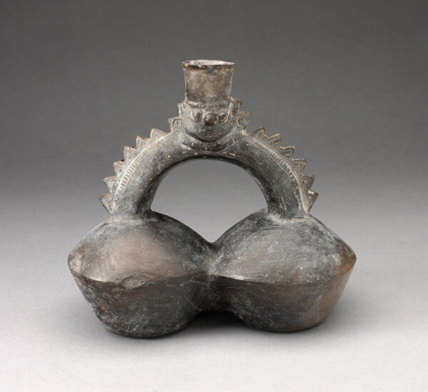 Double-Chambered Vessel with Serrated Stirrup Spout in Form of Human Head