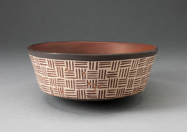 One of a Pair of Bowls with Textile-Like Pattern