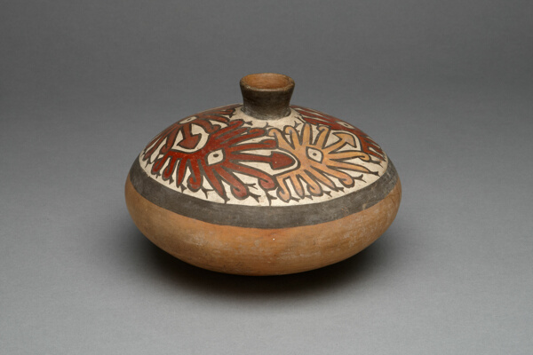 Low Jar with Small Spout Depicting a Repeated Abstract Star or Face Motif