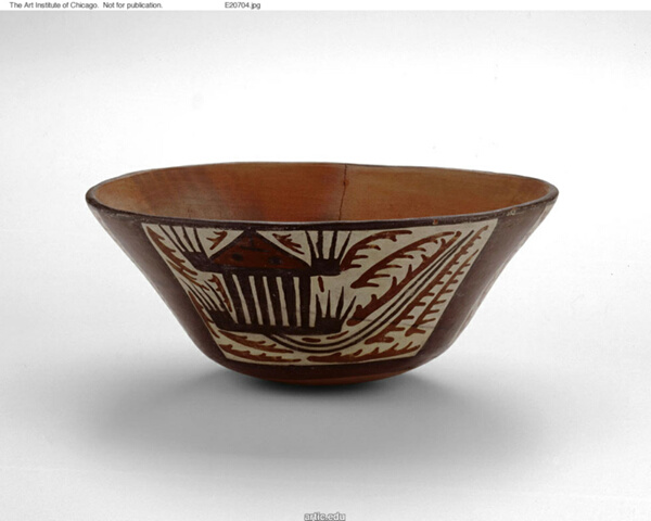 Open Bowl with Areas Depicting Abstract Plants and Animal Motifs